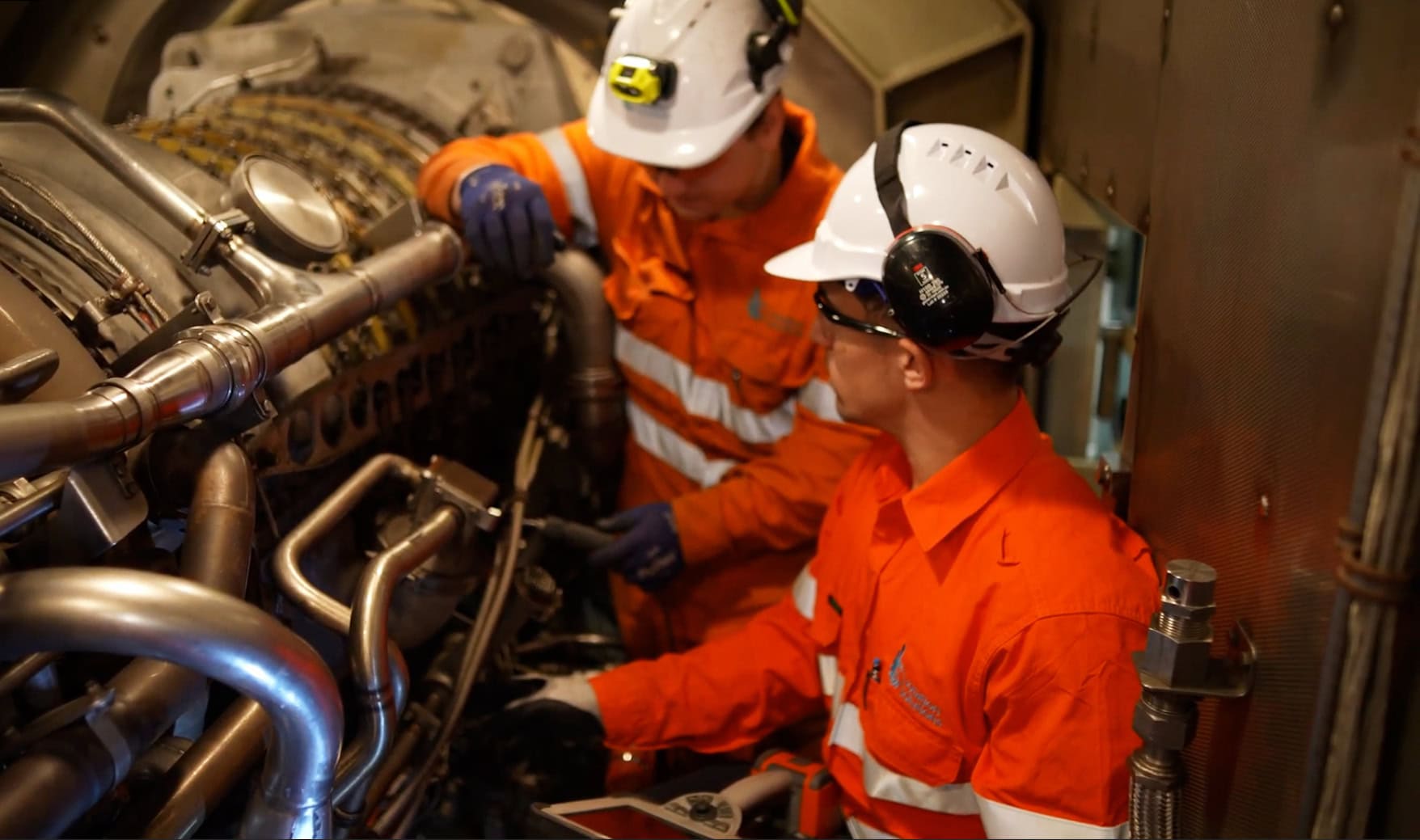Two engineers working on a Gas Turbine